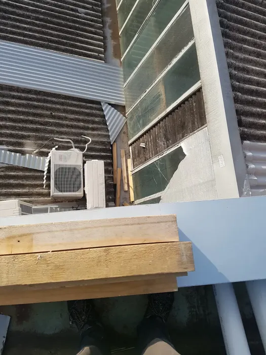 Metal roof sheets around a framed skylight opening in Sydney