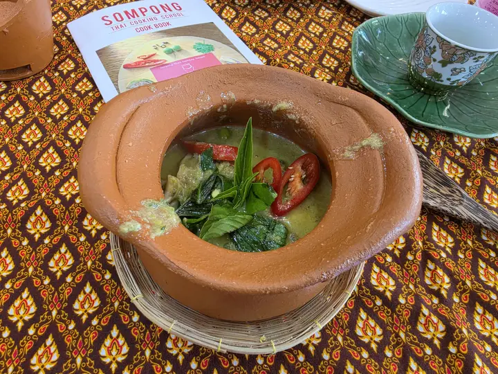A clay bowl of soup at the cooking class