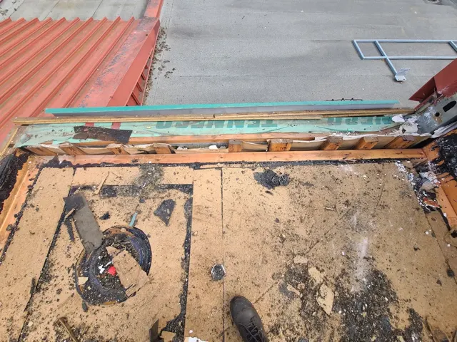 An exposed roof deck during preparation for reroofing.