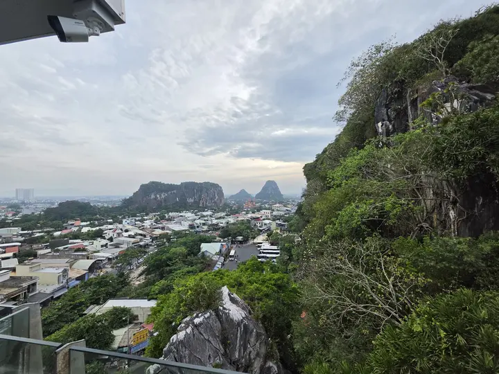Da Nang's rooftops and the coast seen from high on the Marble Mountains